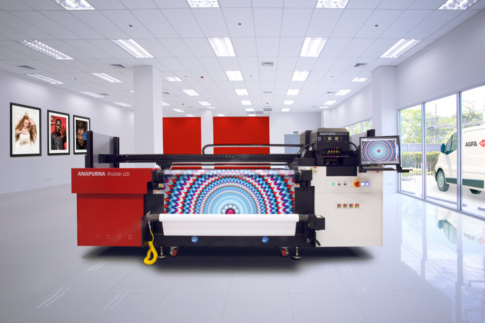 Flatbed UV printer in a professional printing facility producing vibrant and durable prints.